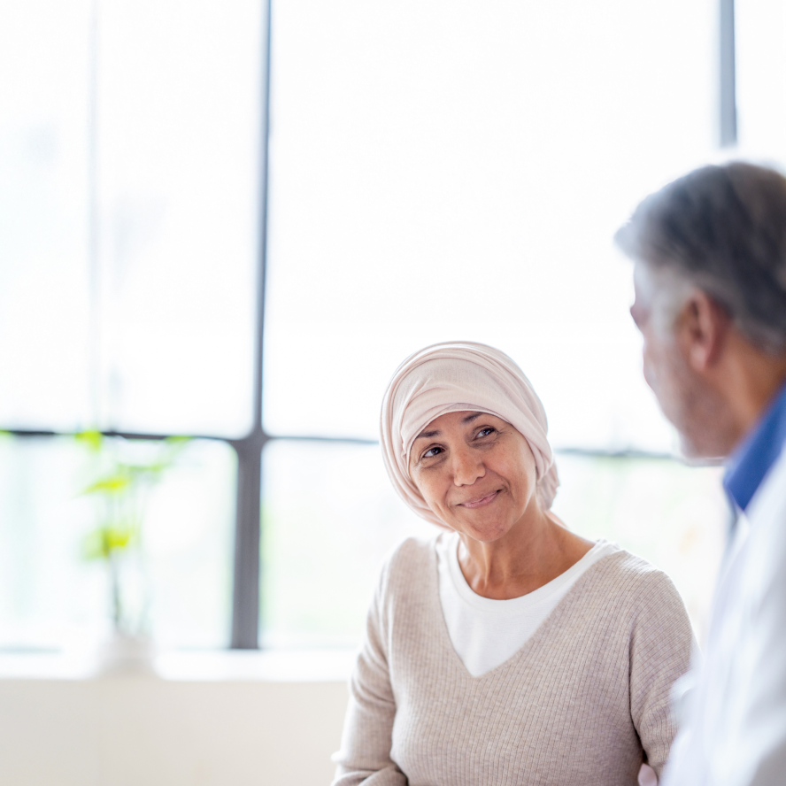 oncology patient with doctor in exam room