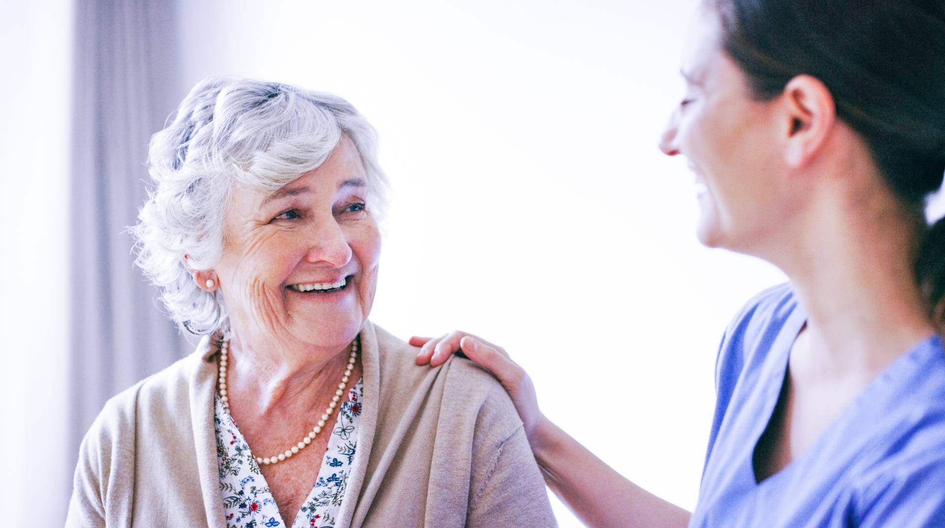 Elderly female pt and nurse_2044x1144